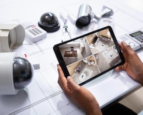 person-watching-footage-tablet-with-security-equipment_1016675-2642 person-watching-footage-tablet-with-security-equipment_1016675-2642