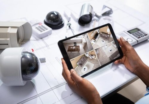 person-watching-footage-tablet-with-security-equipment_1016675-2642 person-watching-footage-tablet-with-security-equipment_1016675-2642