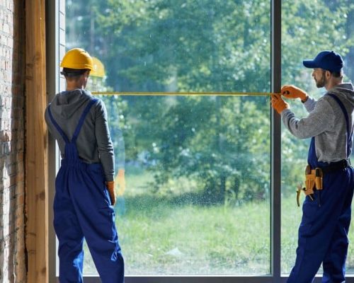 two-young-male-builders-wearing-blue-overalls-using-measuring-tape_386167-4779 two-young-male-builders-wearing-blue-overalls-using-measuring-tape_386167-4779